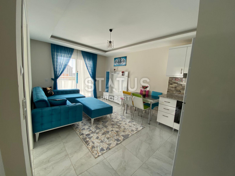 Просторная меблированная квартира 1+1 в Махмутларе, 65 м2. фото 1