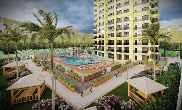 Комплекс на этапе строительства с панорамными видами в Махмутларе. Апартаменты от 54 м2. фото 1