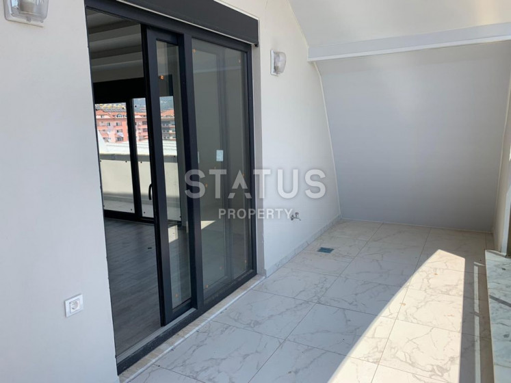 Дуплекс 5+1 в новом доме района Оба, 225 м2. фото 1