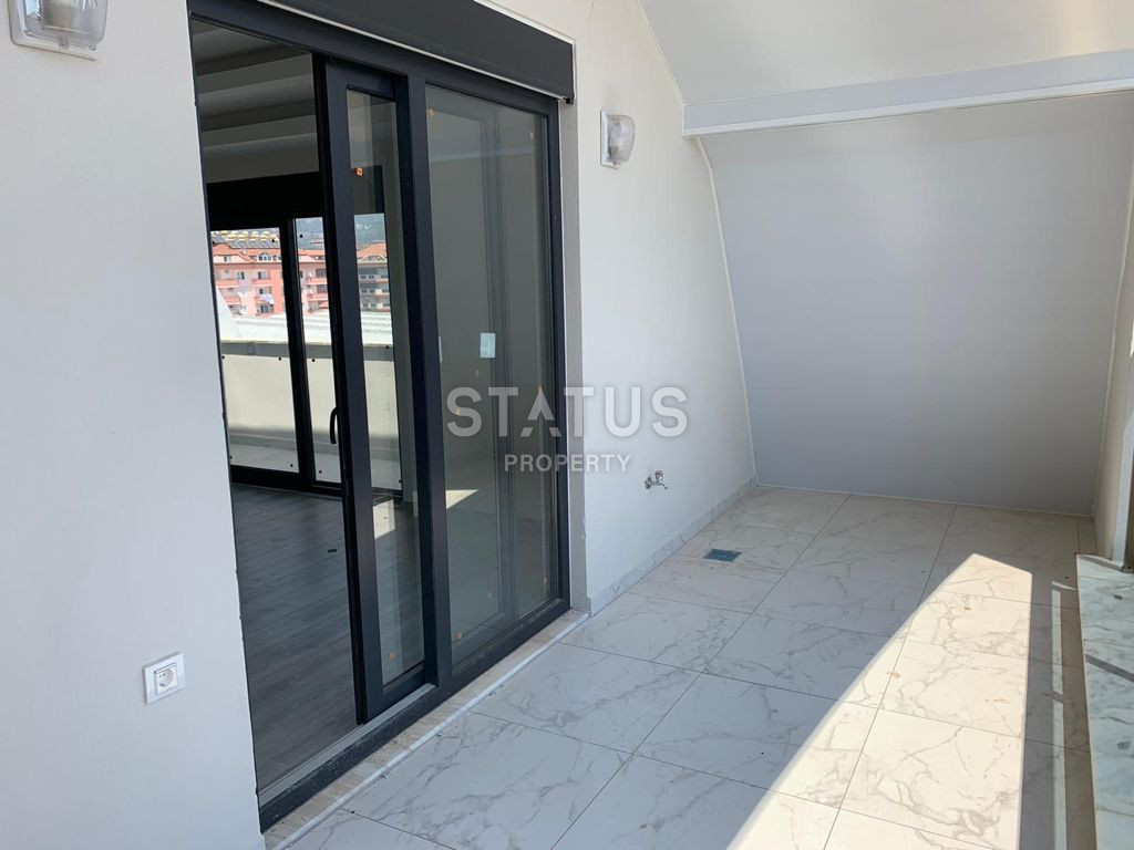 Дуплекс 5+1 в новом доме района Оба, 225 м2. фото 1