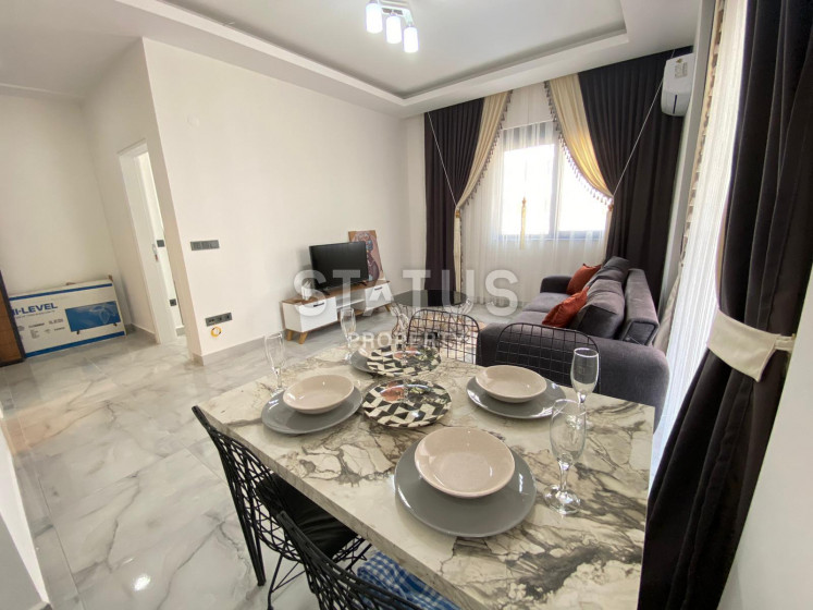 Меблированные апартаменты 1+1 в новом доме, 60 м2. Махмутлар, Алания. фото 1