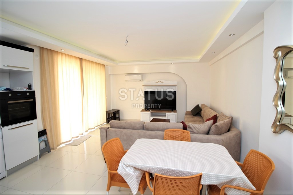 Квартира 1+1 в популярном районе Махмутлар, в 350 метрах от моря, 65 кв.м. фото 3