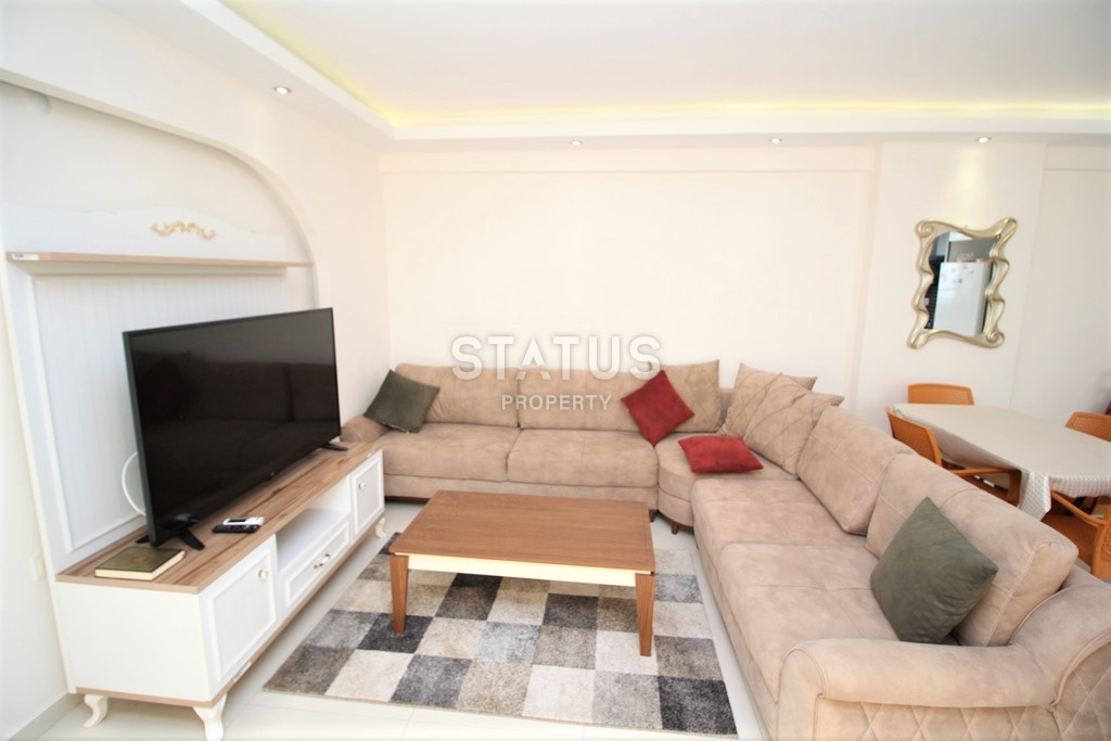 Квартира 1+1 в популярном районе Махмутлар, в 350 метрах от моря, 65 кв.м. фото 4