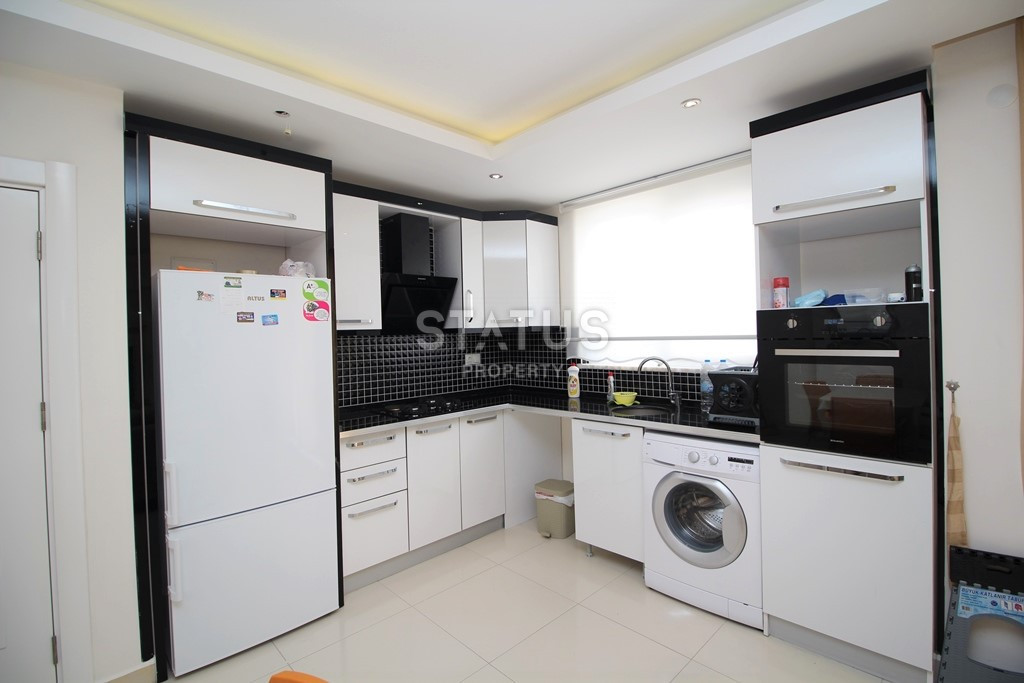 Квартира 1+1 в популярном районе Махмутлар, в 350 метрах от моря, 65 кв.м. фото 5