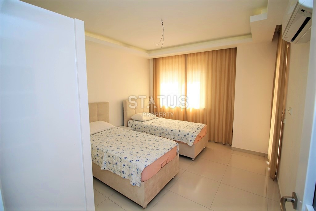 Квартира 1+1 в популярном районе Махмутлар, в 350 метрах от моря, 65 кв.м. фото 6