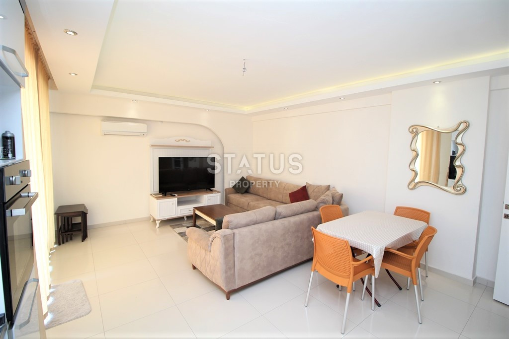 Квартира 1+1 в популярном районе Махмутлар, в 350 метрах от моря, 65 кв.м. фото 7