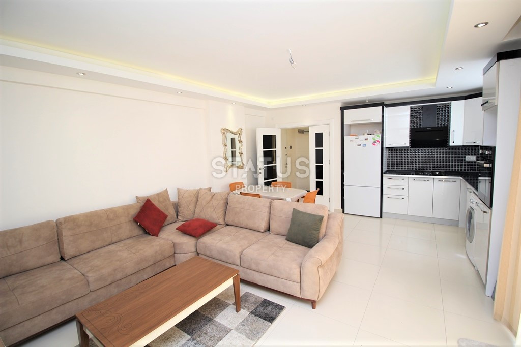 Квартира 1+1 в популярном районе Махмутлар, в 350 метрах от моря, 65 кв.м. фото 9