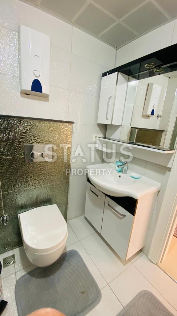 Квартира 1+1 в популярном районе Махмутлар, в 350 метрах от моря, 65 кв.м. фото 22