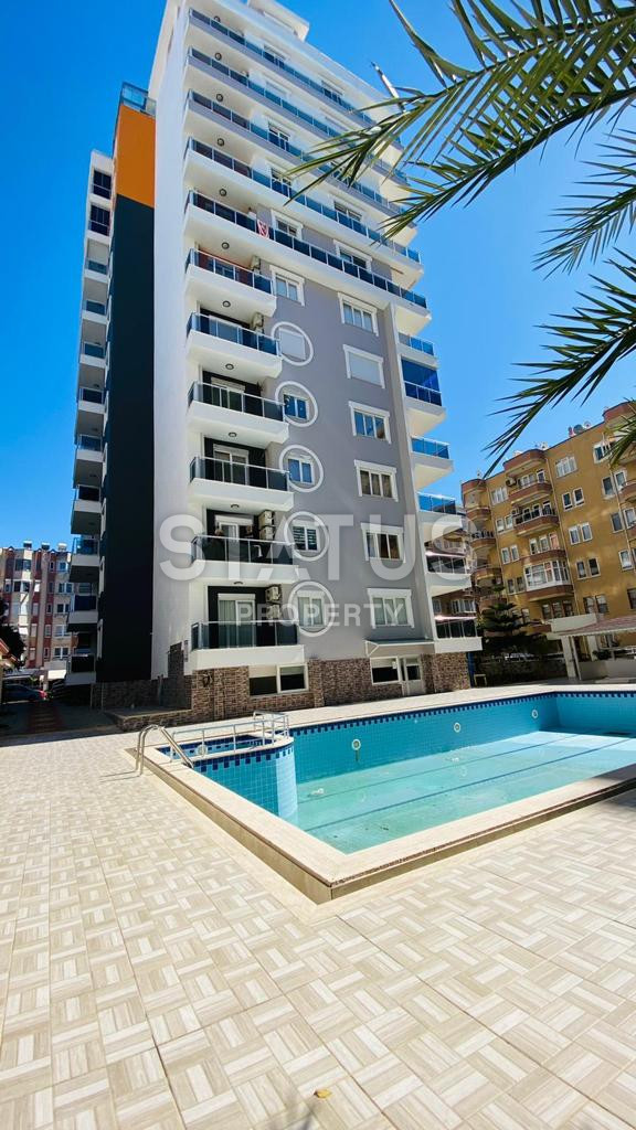 Квартира 1+1 в популярном районе Махмутлар, в 350 метрах от моря, 65 кв.м. фото 24