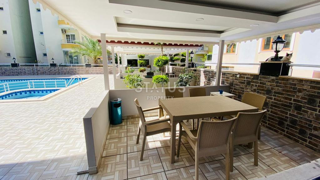 Квартира 1+1 в популярном районе Махмутлар, в 350 метрах от моря, 65 кв.м. фото 30