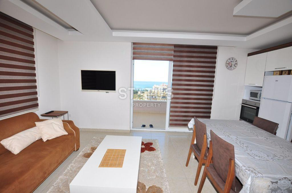 Spacious furnished apartment 1+1 with sea view, 70 m2. Mahmutlar, Alanya. фото 10