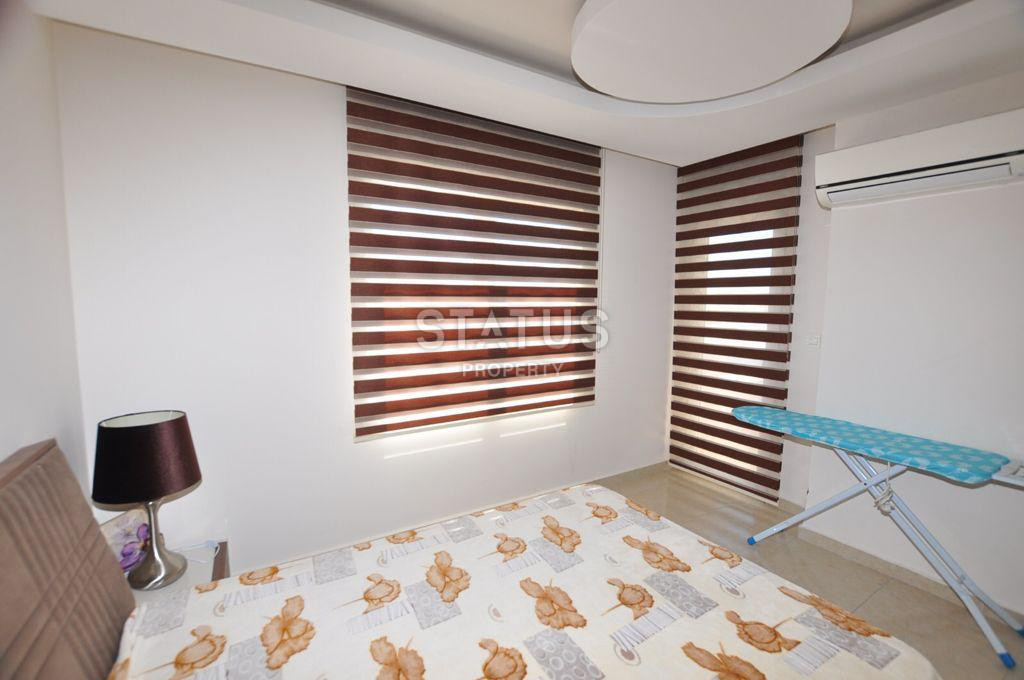 Spacious furnished apartment 1+1 with sea view, 70 m2. Mahmutlar, Alanya. фото 11