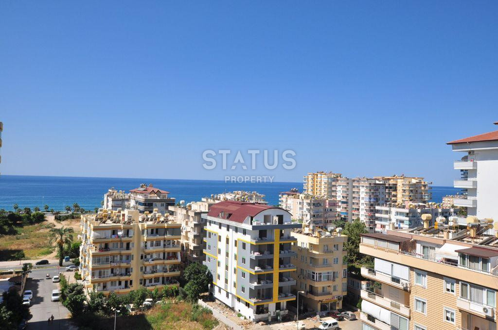 Spacious furnished apartment 1+1 with sea view, 70 m2. Mahmutlar, Alanya. фото 14