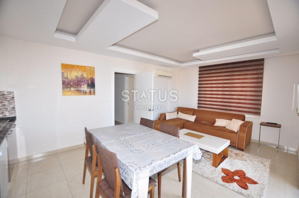 Spacious furnished apartment 1+1 with sea view, 70 m2. Mahmutlar, Alanya. фото 17