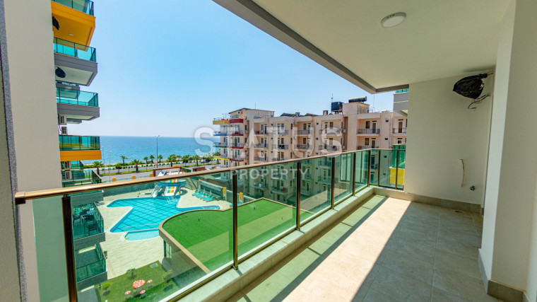 Квартира 2+1 на первой береговой линии в районе Махмутлар. фото 1