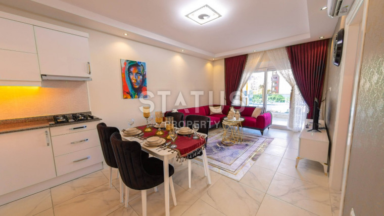 Отличная квартира 1+1 с новой мебелью и техникой, 65 м2.  Махмутлар фото 1