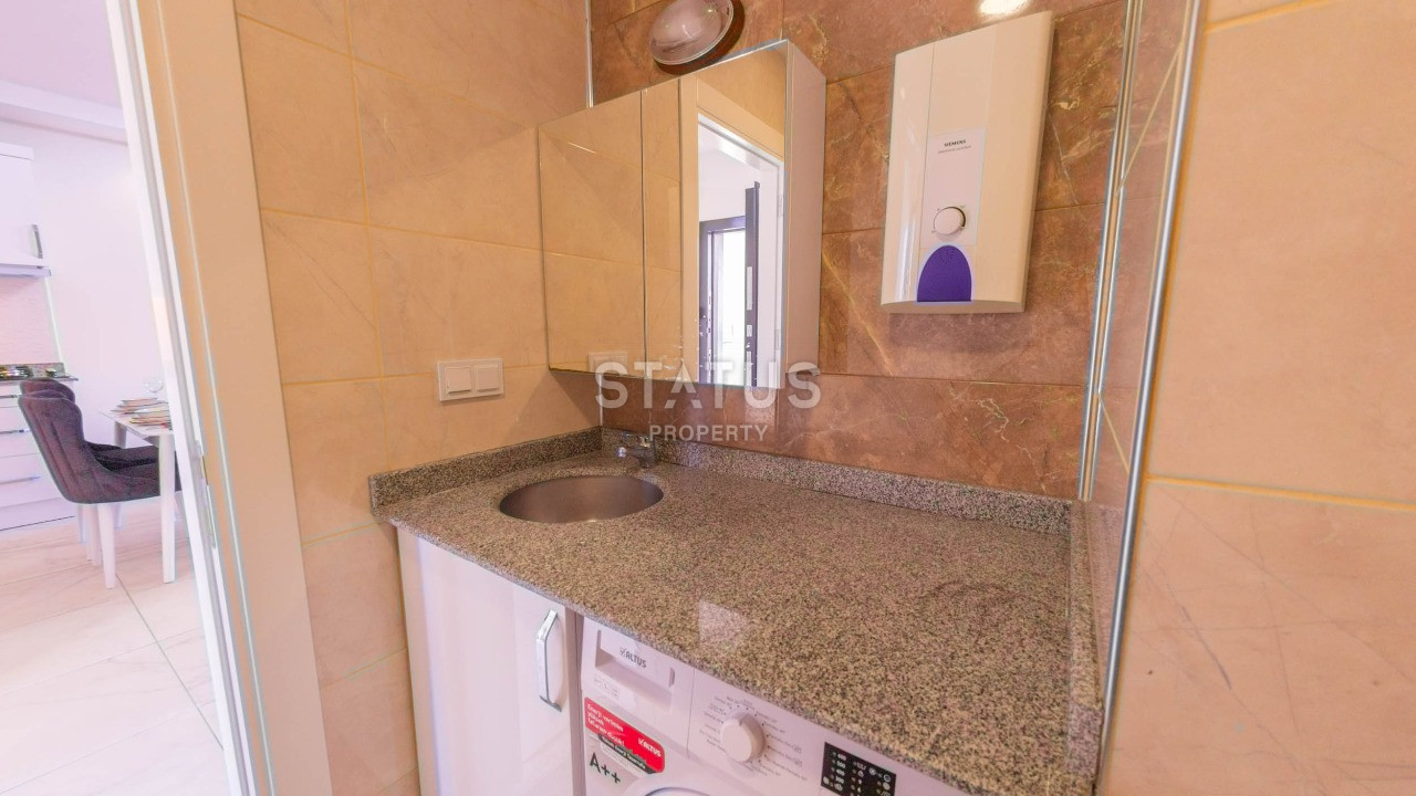 Отличная квартира 1+1 с новой мебелью и техникой, 65 м2.  Махмутлар фото 14