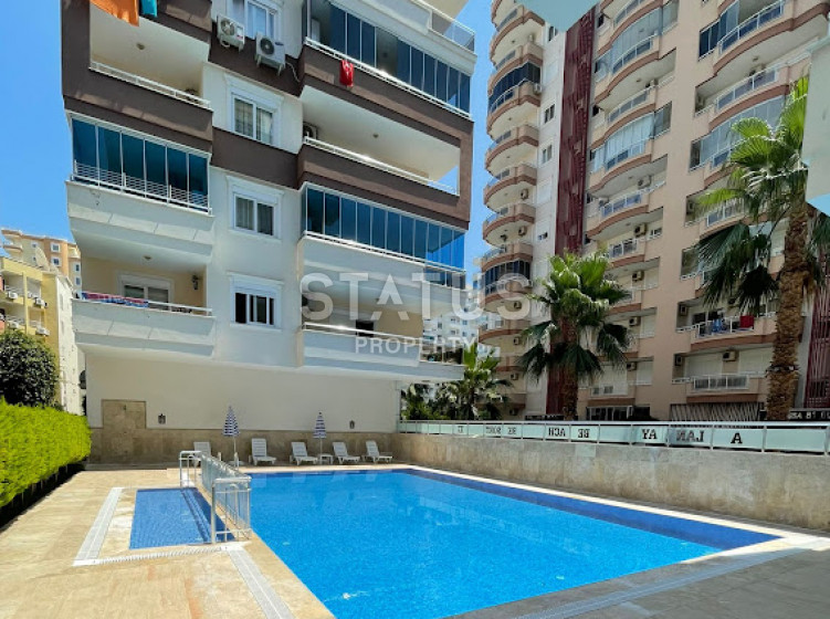 Просторная квартира 1+1 в нескольких шагах от моря в Махмутларе, 65 м2. фото 1