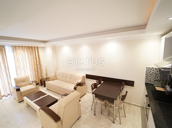 Spacious apartment 1+1 a few steps from the sea in Mahmutlar, 65 m2. фото 12