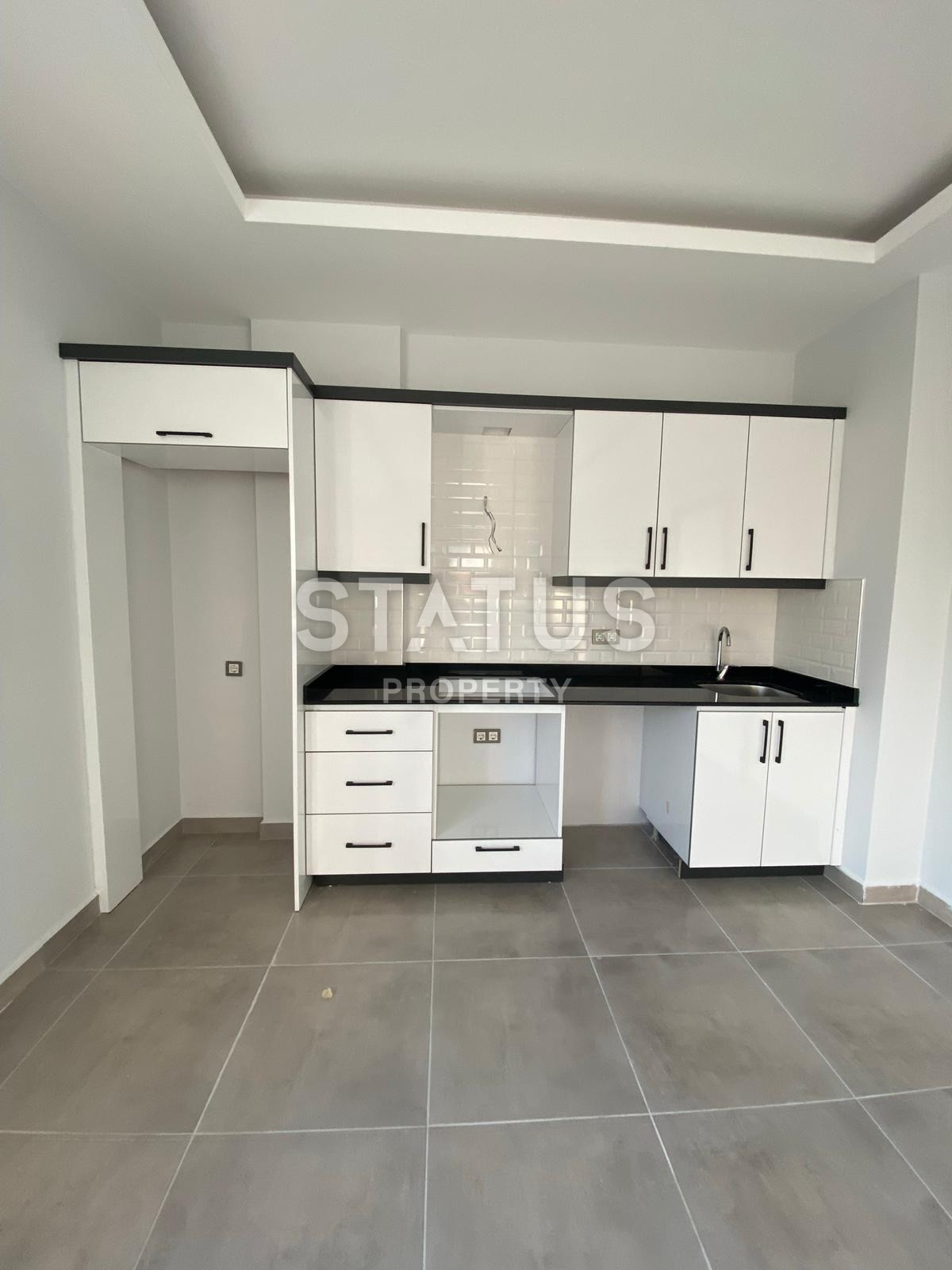 Квартира 1+1 в новом комплексе в Махмутларе, 56 кв.м. фото 7