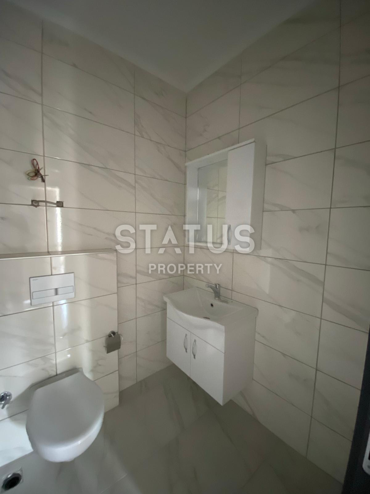 Квартира 1+1 в новом комплексе в Махмутларе, 56 кв.м. фото 11