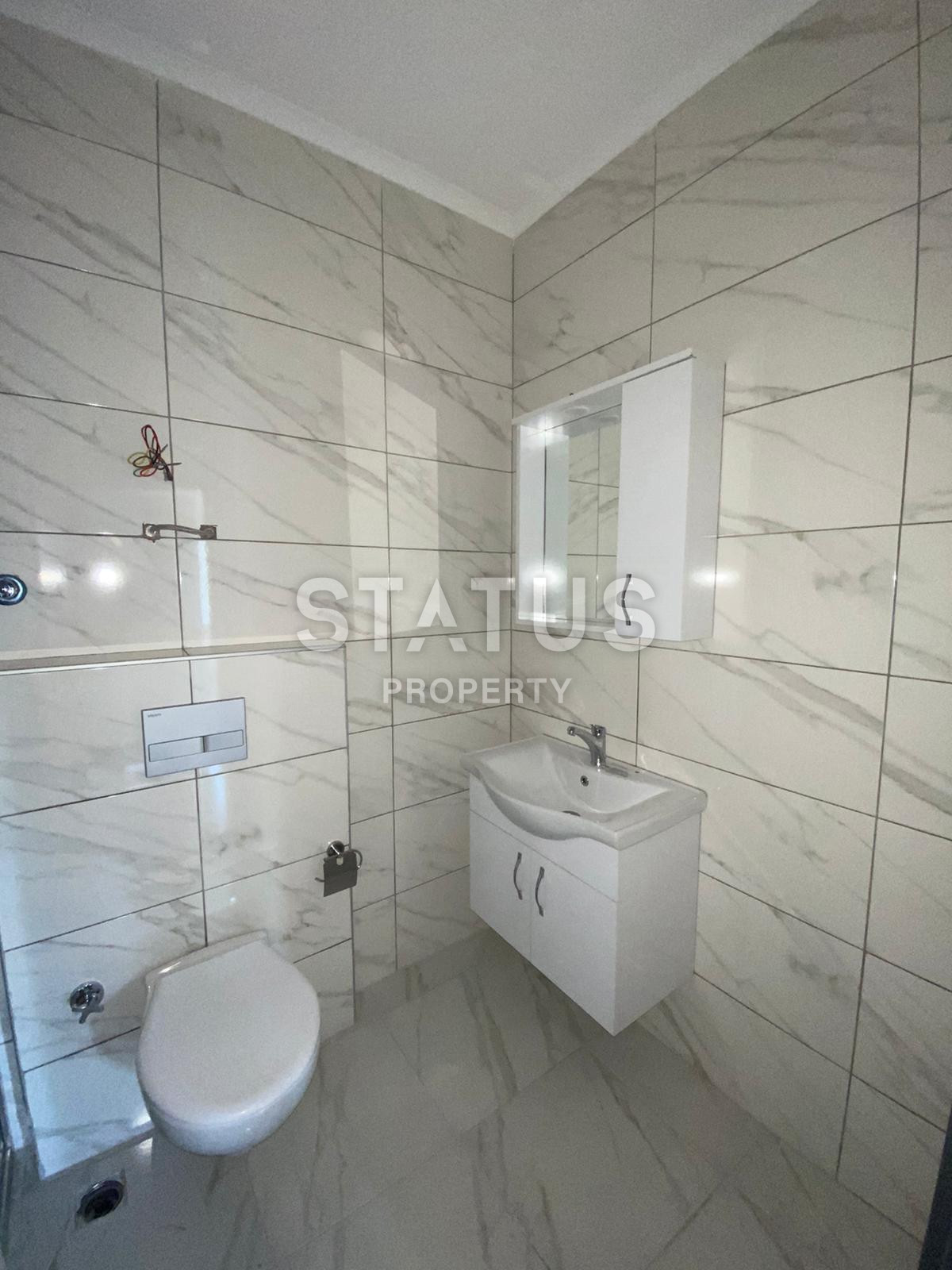 Квартира 1+1 в новом комплексе в Махмутларе, 56 кв.м. фото 14