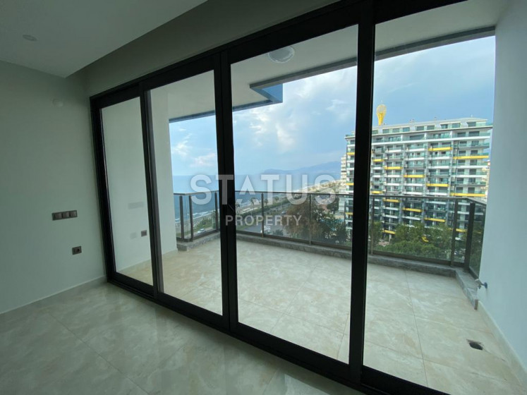 Квартира 1+1 в элитном комплексе на первой береговой линии с видом на море, Махмутлар фото 1