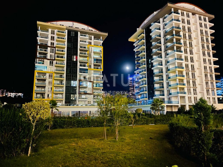 Квартира в новом доме с мебелью и техникой 1+1 в Махмутларе. фото 1