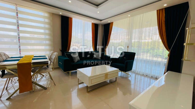 Двухкомнатная квартира  с новой мебелью и техникой в Махмутларе, 71м2 фото 1