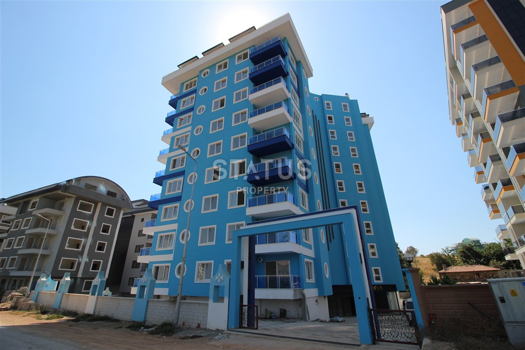Меблированные апартаменты 1+1 в новом доме. Махмутлар, 65м2. фото 2