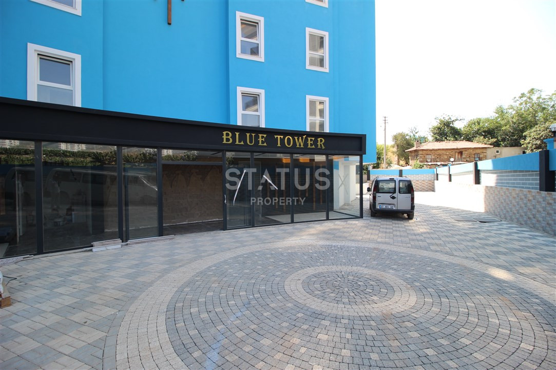 Furnished apartments 1+1 in a new house. Mahmutlar, 65m2. фото 4