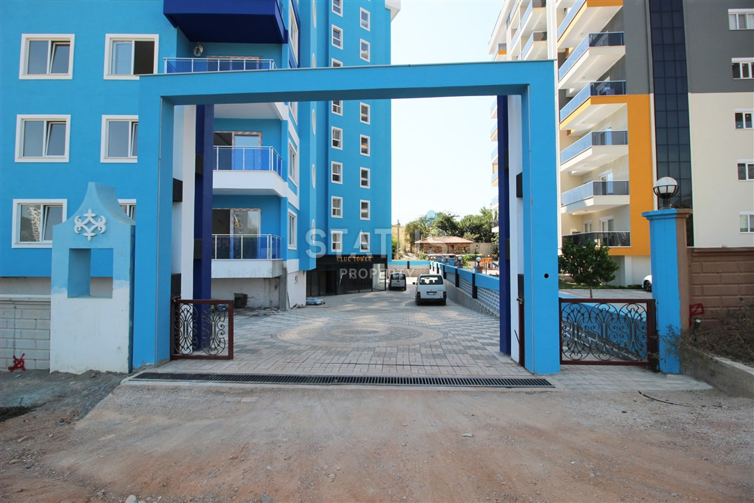 Furnished apartments 1+1 in a new house. Mahmutlar, 65m2. фото 5