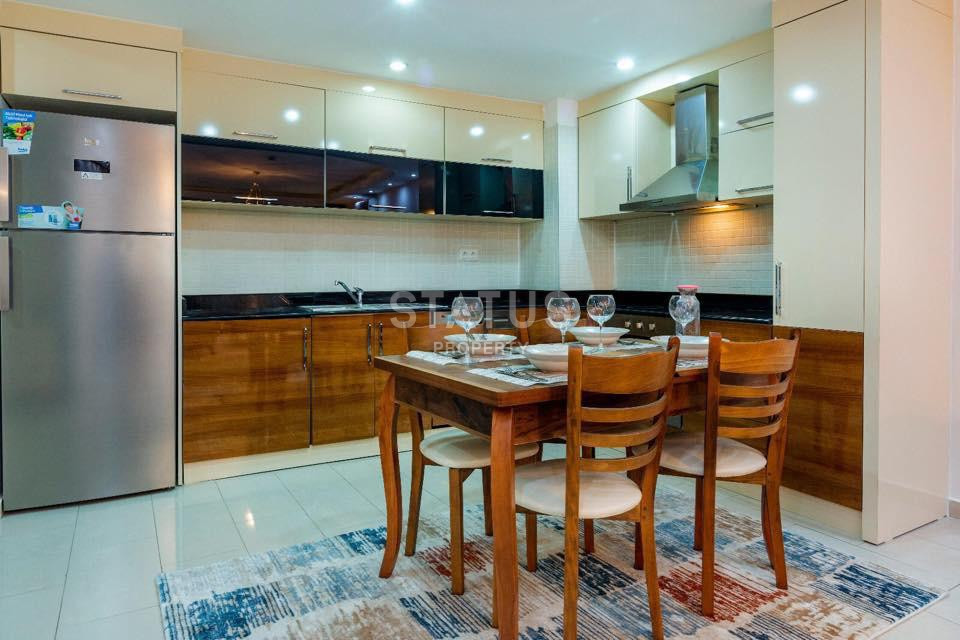 Квартира с двумя спальнями в 700 метрах от моря в Махмутларе, 110 кв.м. фото 16