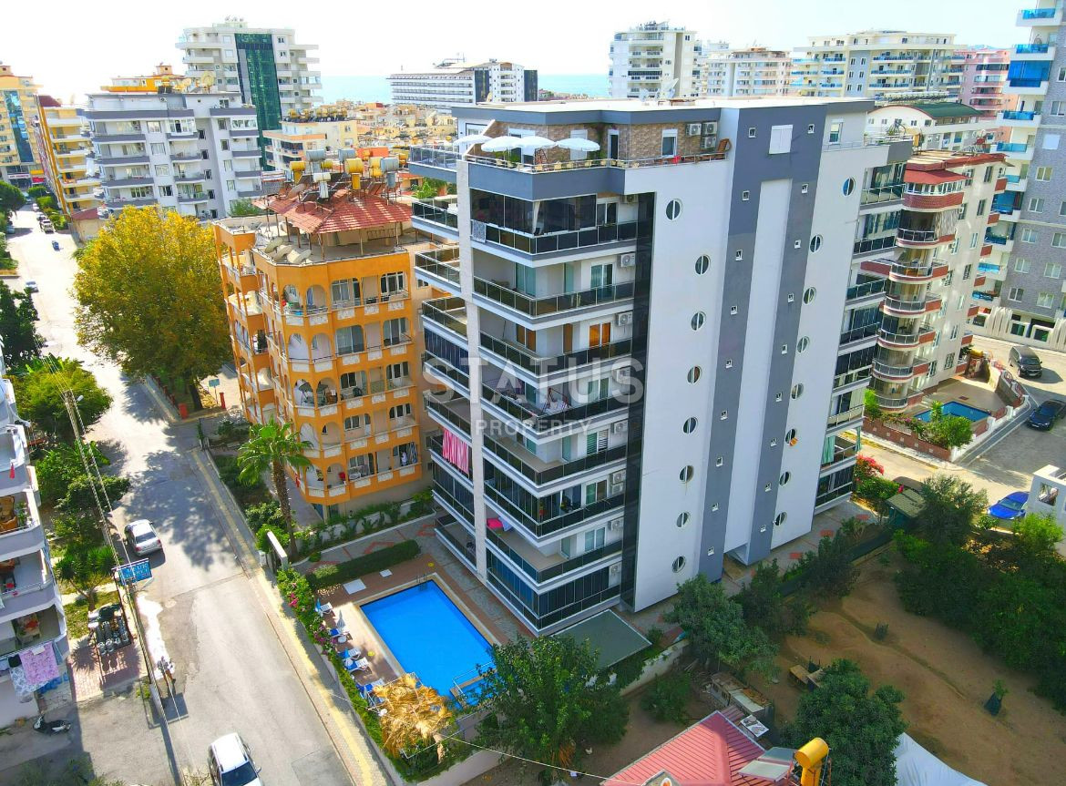 Крупнометражные апартаменты 1+1 с видом на горы в Махмутларе, 85 м2. фото 1