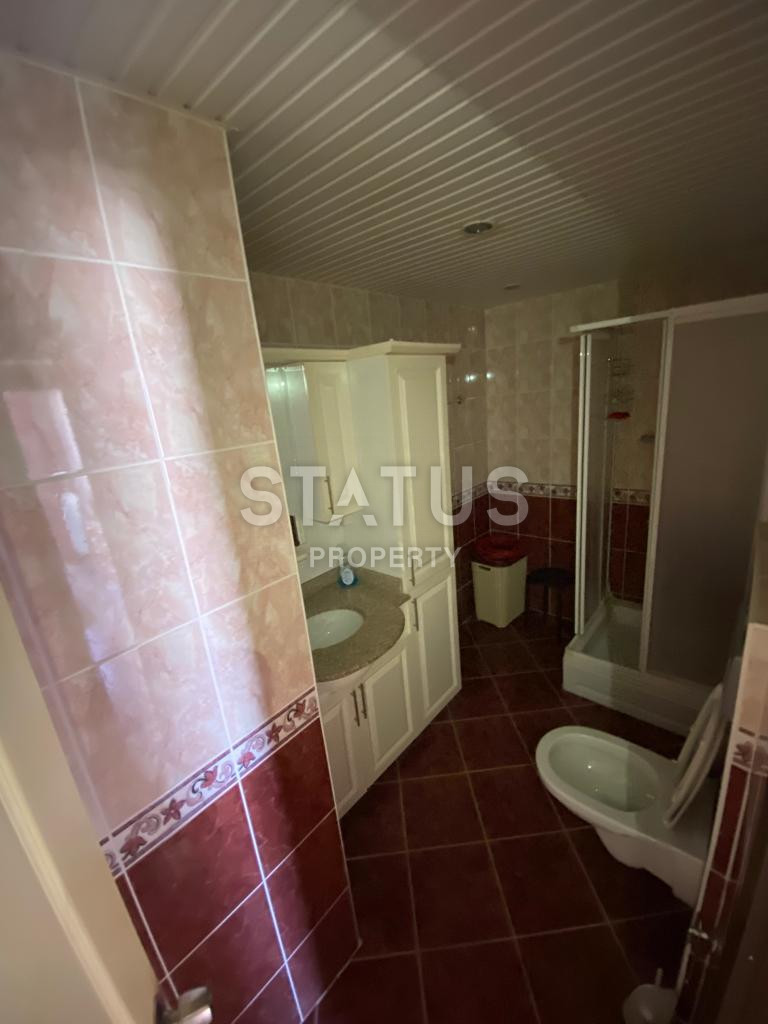 Квартира с тремя спальнями в 600 метрах от моря, в Махмутларе, 140 кв.м. фото 5