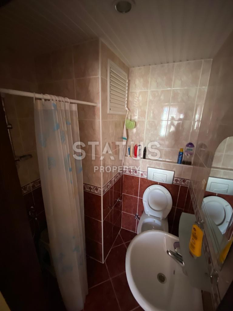 Квартира с тремя спальнями в 600 метрах от моря, в Махмутларе, 140 кв.м. фото 8