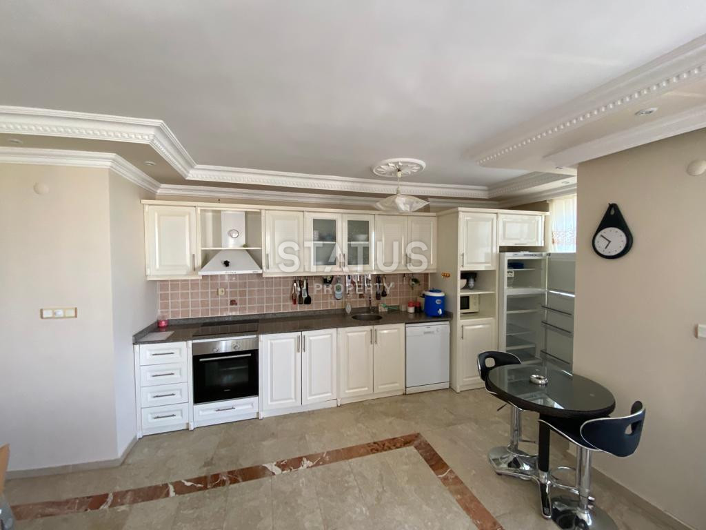 Квартира с тремя спальнями в 600 метрах от моря, в Махмутларе, 140 кв.м. фото 17