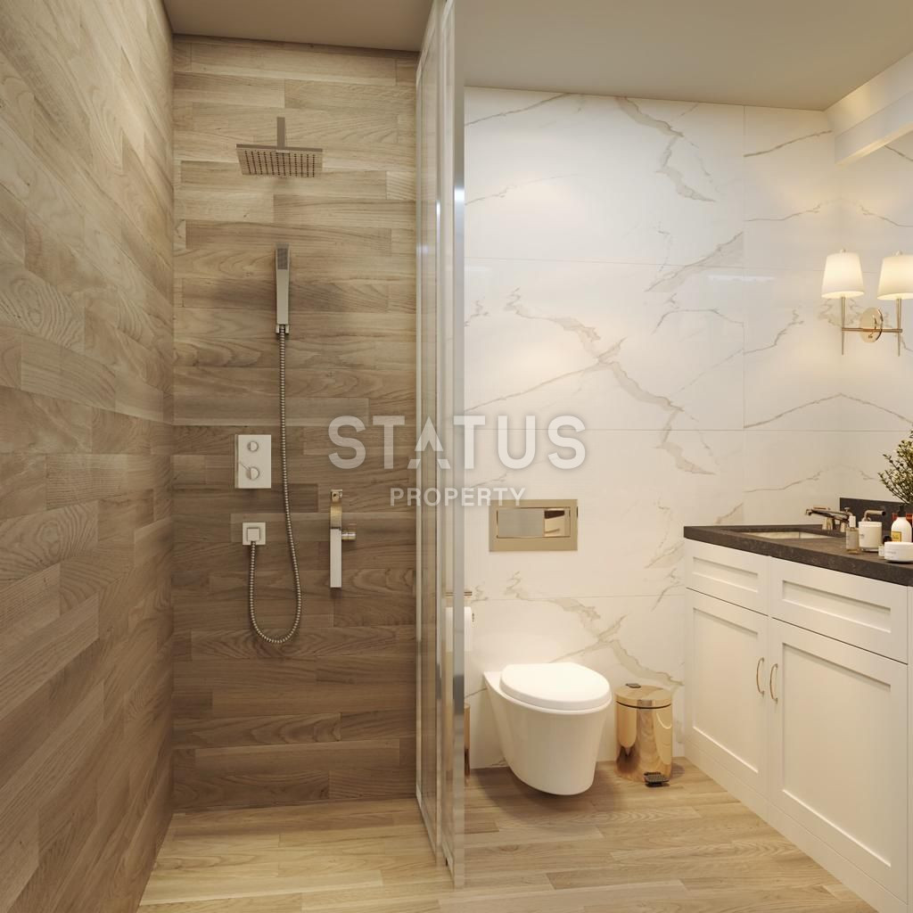 Выгодный инвестиционный проект на этапе котлована в самом центре района Махмутлар, 51-150 м.кв. фото 8