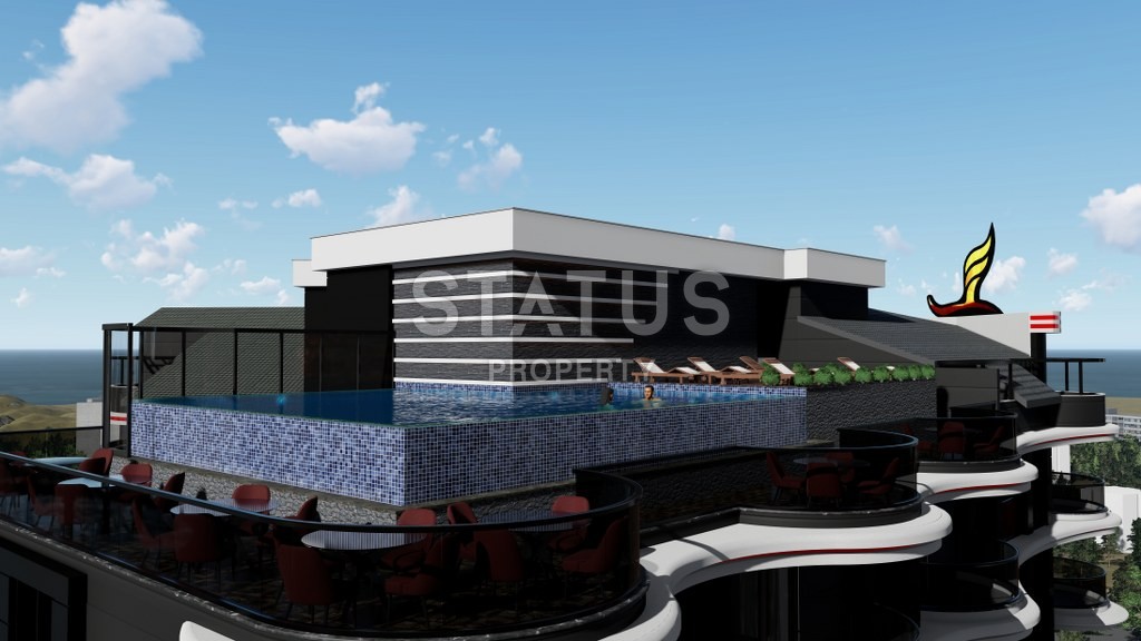 Новый инвестиционный проект повышенного комфорта с инфинити бассейном на крыше в районе Махмутлар 65-135 кв.м. фото 4