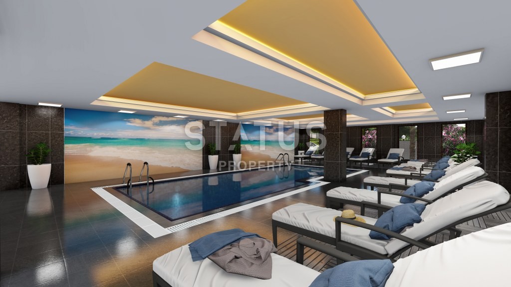 Новый инвестиционный проект повышенного комфорта с инфинити бассейном на крыше в районе Махмутлар 65-135 кв.м. фото 9