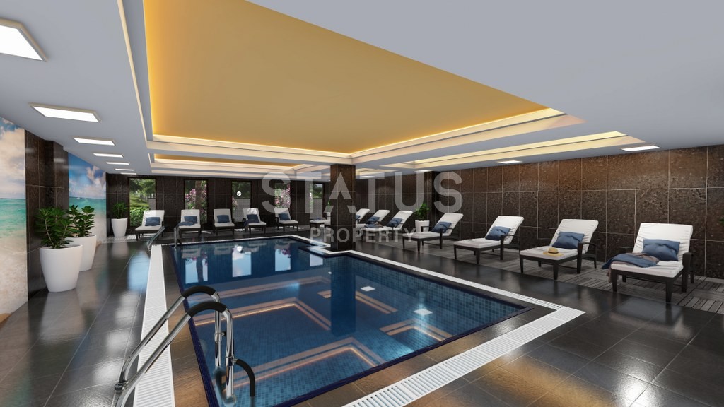 Новый инвестиционный проект повышенного комфорта с инфинити бассейном на крыше в районе Махмутлар 65-135 кв.м. фото 22