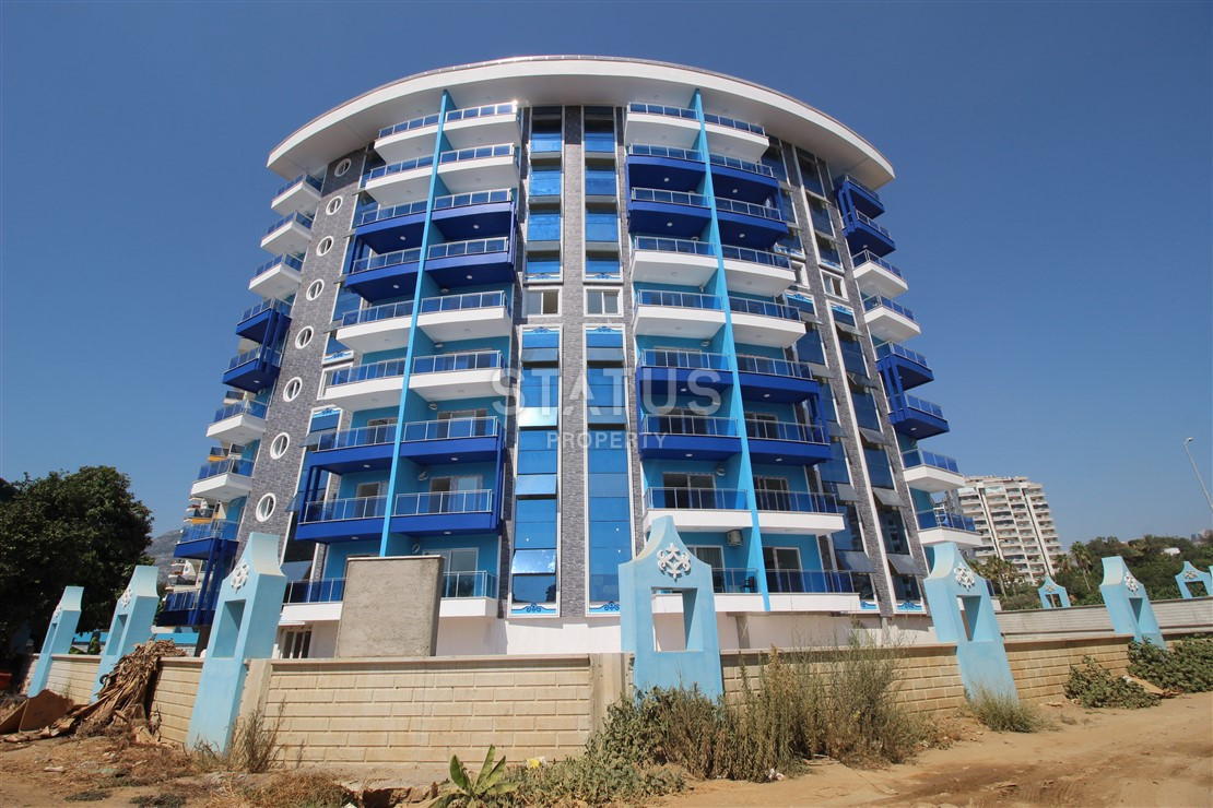 Квартира 1+1 с видом на Наулу в новом комплексе в Махмутларе, 55 м2. фото 16