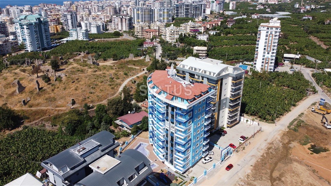 Квартира 1+1 с видом на Наулу в новом комплексе в Махмутларе, 55 м2. фото 23