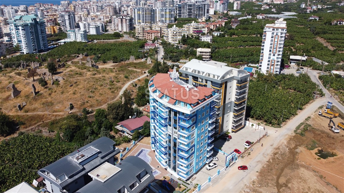 Квартира 1+1 с видом на Наулу в новом комплексе в Махмутларе, 55 м2. фото 24