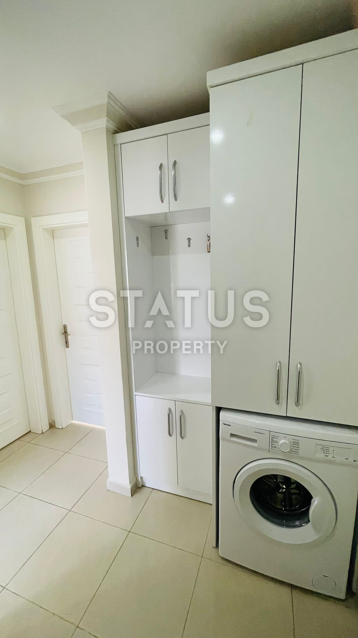 Меблированная двухкомнатная квартира в новом доме в центре Махмутлара, 55 кв.м. фото 4