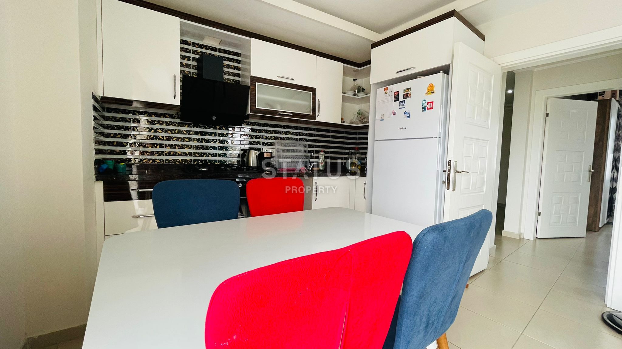 Меблированная двухкомнатная квартира в новом доме в центре Махмутлара, 55 кв.м. фото 5