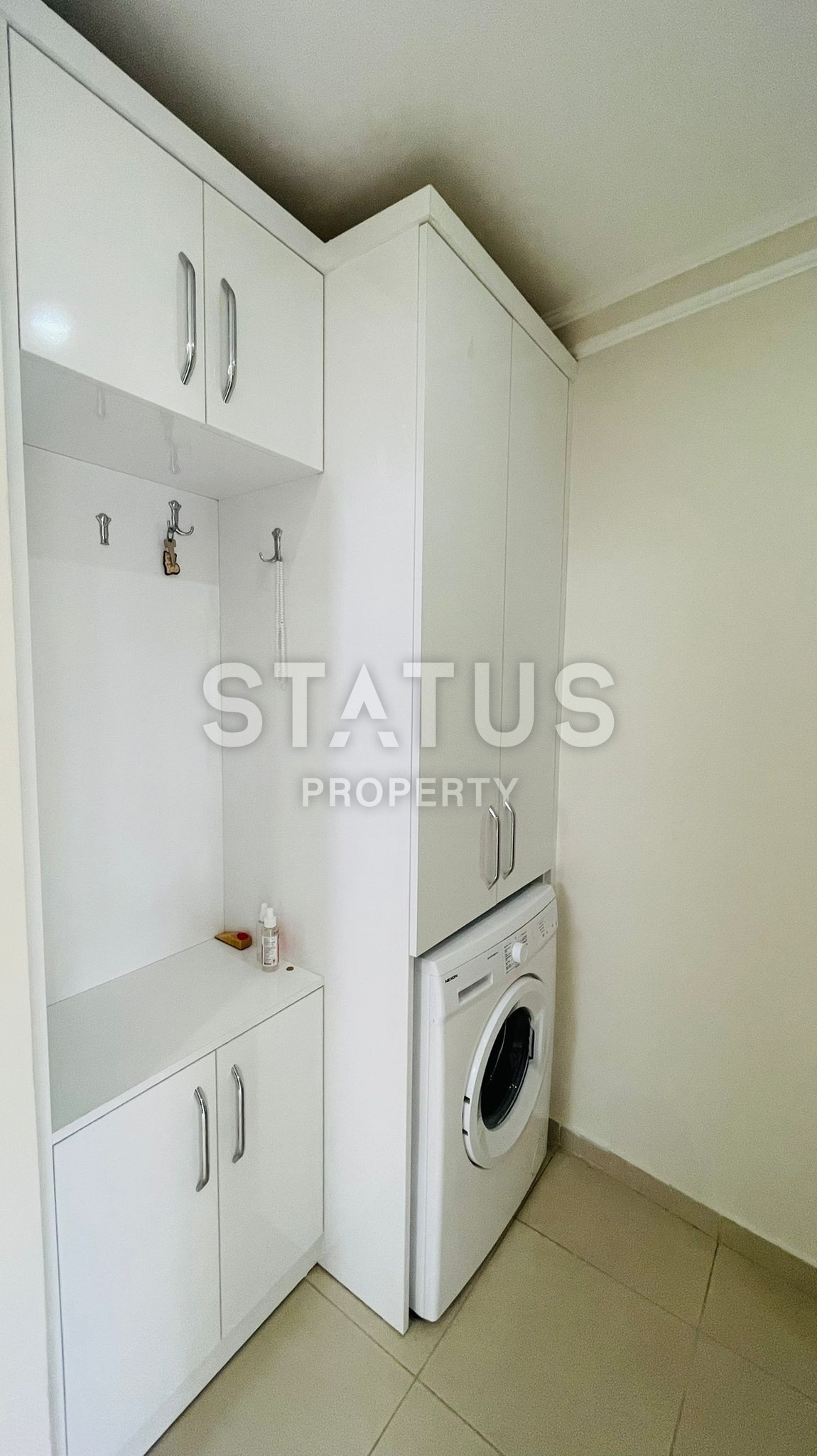 Меблированная двухкомнатная квартира в новом доме в центре Махмутлара, 55 кв.м. фото 11