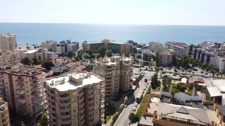 Апартаменты 2+1, в районе Тосмур, 250 метров от моря, 130 кв.м. фото 1