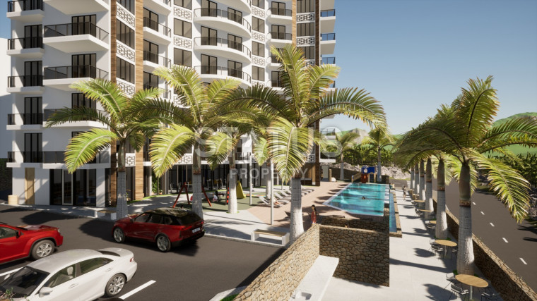 Инвестиционный проект в районе Махмутлар, квартиры с видом на море и горы, 53-78 м2 фото 1