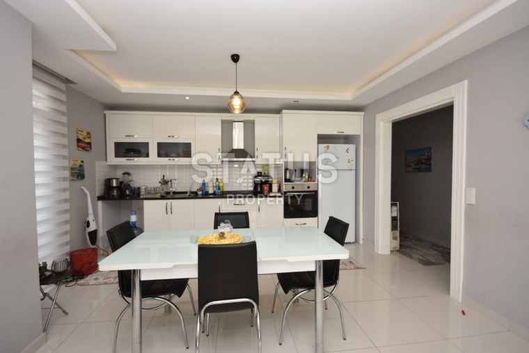 Мебелированные апартаменты 1+1, в 100 метрах от моря, в районе Махмутлар, 80 кв.м. фото 1